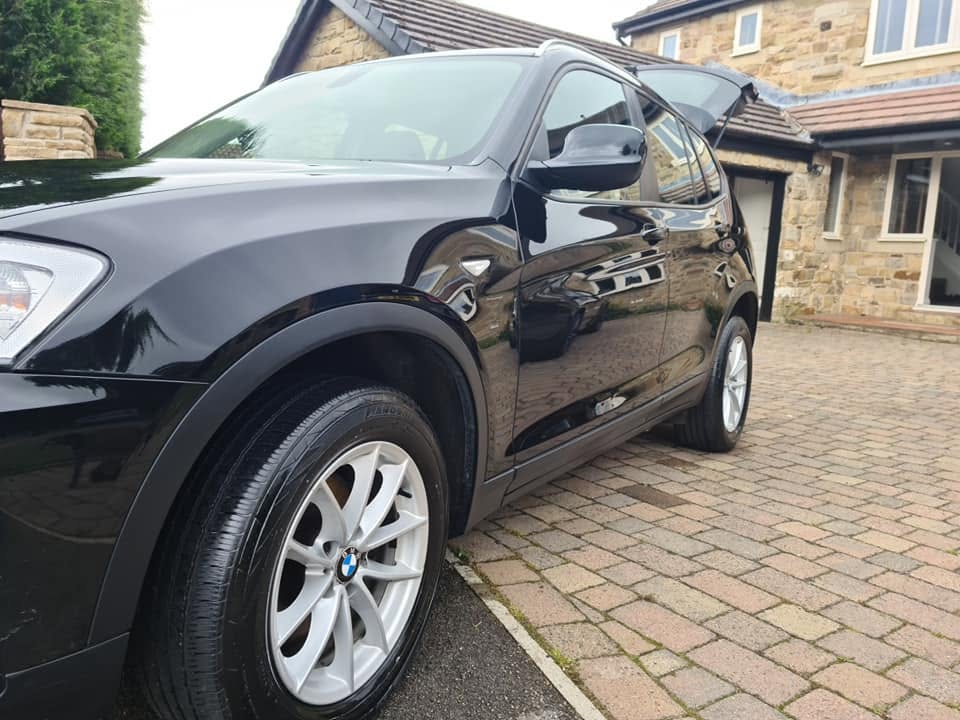 BMW X3 at customer driveway — mobile unit full detail, ready to collect
