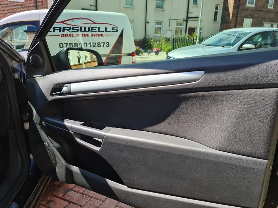 Door card detail — every surface dressed and protected