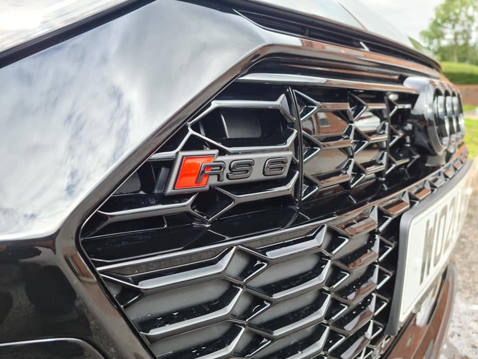 Audi RS6 honeycomb grille badge — precision cleaning on every surface