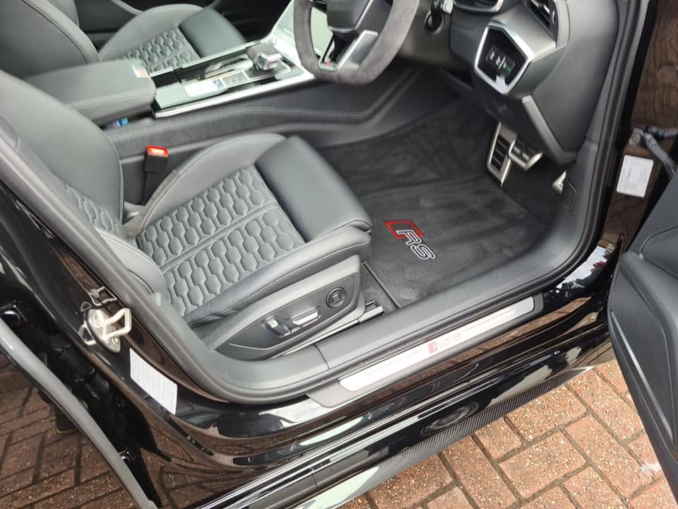Audi RS6 driver seat and RS floor mat — deep cleaned and dressed interior