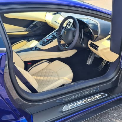 Lamborghini Aventador interior — cream leather and carbon detail