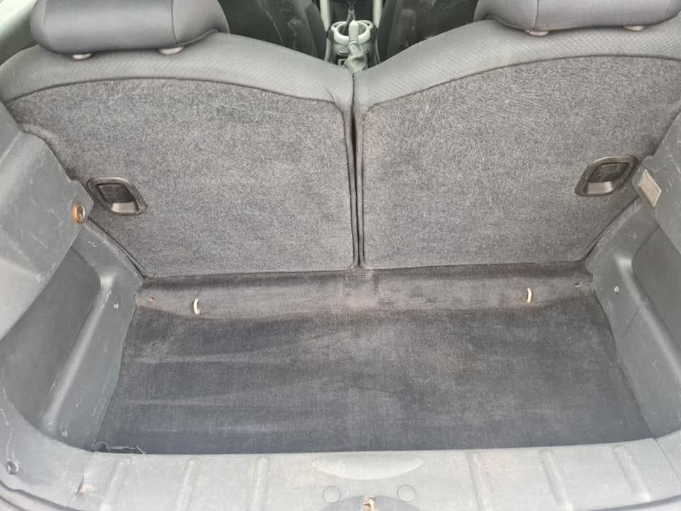 Boot area after — pet hair fully removed, carpet deep vacuumed and refreshed
