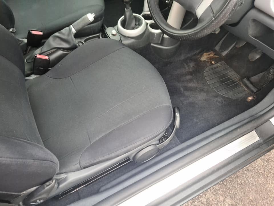 MINI interior before — mud and dirt on carpet near pedals, soiled mat