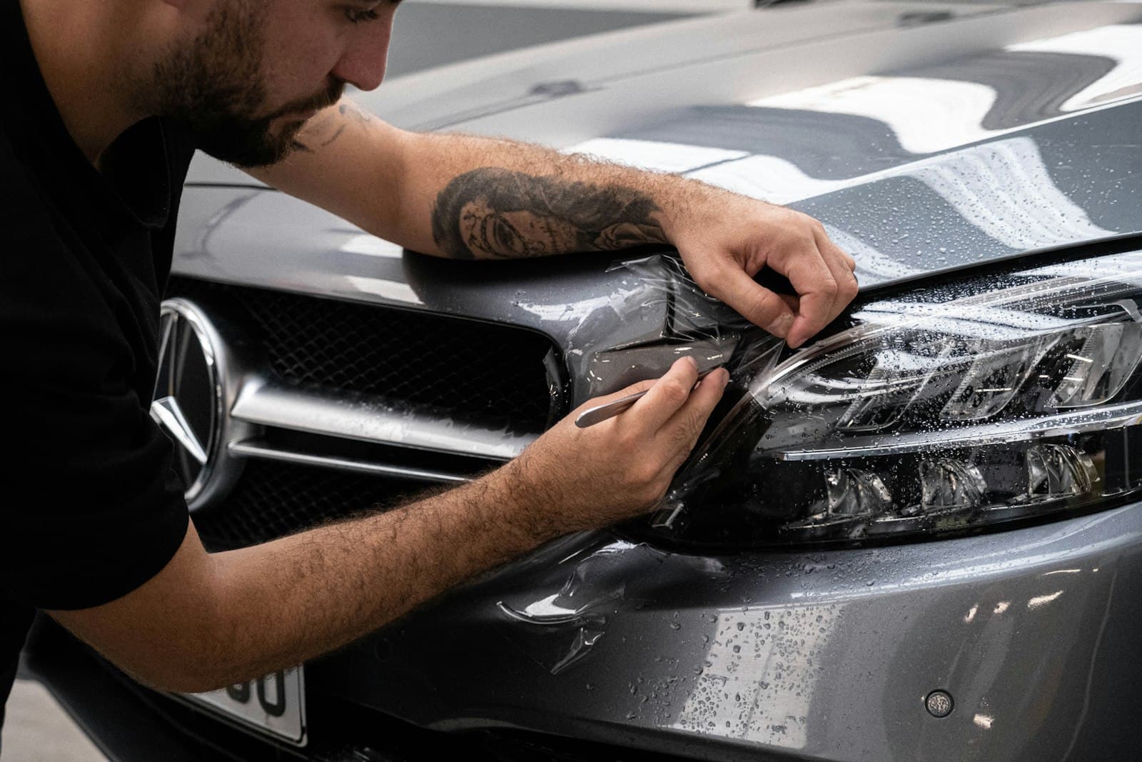 Precision paint protection work on a prestige front end — Concours Finish craftsmanship